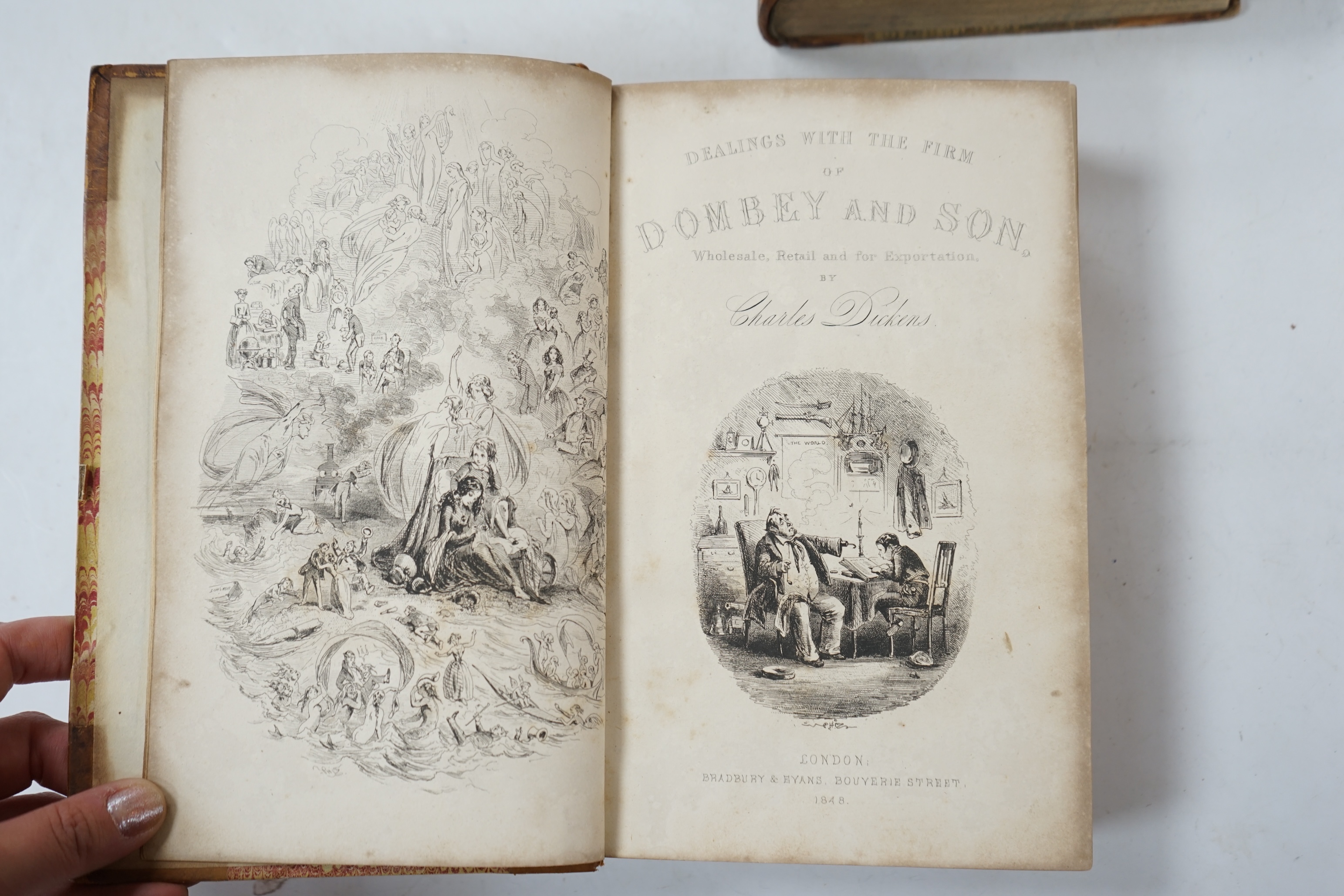 Dickens, Charles - Dombey and Son. 1st edition. engraved pictorial and printed titles, frontis. and 38 plates (by H.K. Browne); old half calf and marbled boards. Bradbury and Evans, 1848